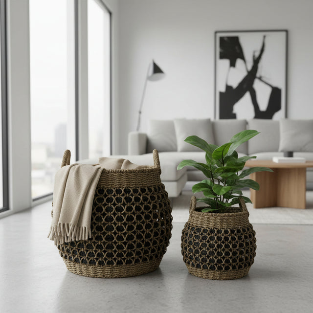Woven baskets with a blanket and plant in a modern living room.