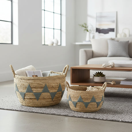 Woven baskets with geometric patterns on a living room floor.