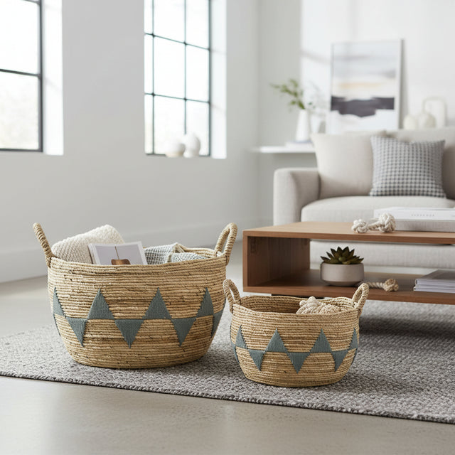 Woven baskets with geometric patterns on a living room floor.