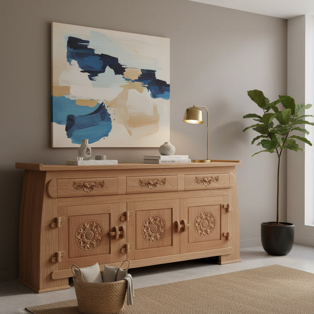 Elegant natural wood sideboard featuring three drawers and three cabinet doors with intricate floral medallion carvings and decorative detailing.