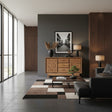 Elegant natural wood sideboard featuring four central drawers and two cabinet doors with intricate floral carvings, raised on short wooden legs for a refined handcrafted look.
