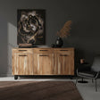 Modern natural wood sideboard featuring three drawers, three cabinet doors, sleek black handles, and black metal legs, styled in an elegant contemporary interior.