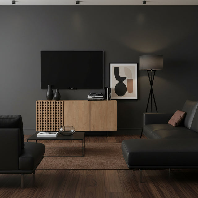 Modern natural wood TV unit featuring decorative slatted detailing, minimalist cabinet doors, and slim black legs, styled in a sophisticated contemporary living room.