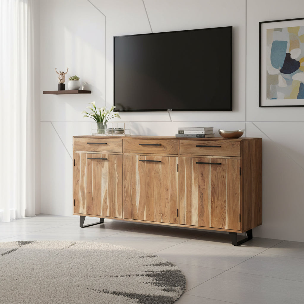 Modern natural wood TV unit with three drawers, three cabinet doors, sleek black handles, and black metal legs, styled beneath a wall-mounted television.