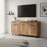 Modern natural wood TV unit with three drawers, three cabinet doors, sleek black handles, and black metal legs, styled beneath a wall-mounted television.