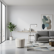 Ivory upholstered round ottoman with a minimalist design, ideal as a footrest, occasional seat, or modern accent piece for living rooms and bedrooms.