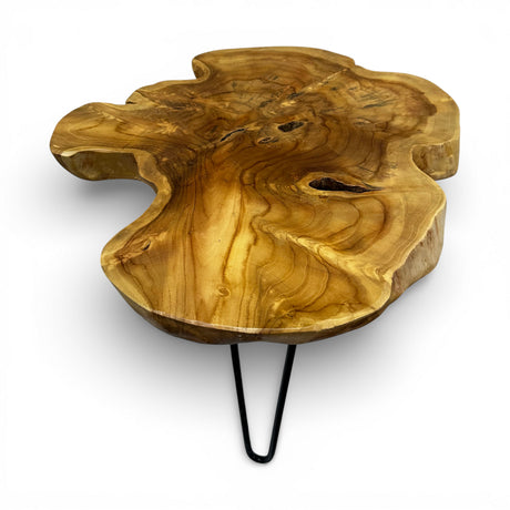 Handcrafted coffee table featuring a freeform live edge solid wood tabletop with rich natural grain, knots, and organic contours, supported by sleek black metal hairpin legs. A one-of-a-kind statement piece that blends rustic craftsmanship with modern industrial style, perfect for living rooms, boutique hotels, lodges, or contemporary interiors.