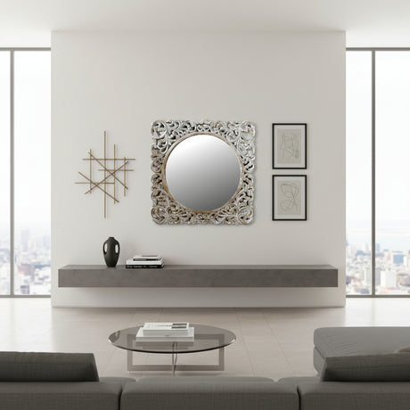 Ornate carved wooden wall mirror featuring an intricately hand-carved floral frame with a distressed whitewashed finish. This elegant statement mirror adds timeless charm and sophistication to entryways, bedrooms, living rooms, and traditional, coastal, farmhouse, or luxury interiors.