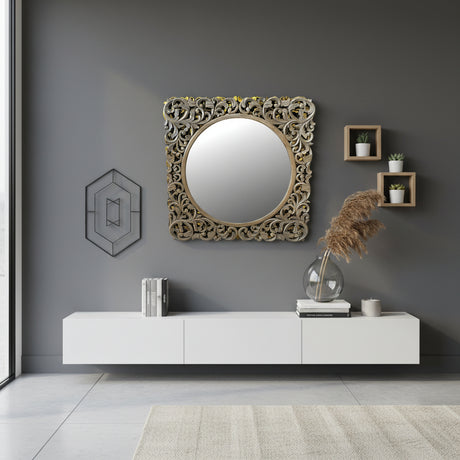 Ornate carved wooden wall mirror featuring an intricately hand-carved botanical frame with a distressed natural wood finish. This timeless statement mirror enhances entryways, bedrooms, living rooms, and hallways while complementing traditional, farmhouse, coastal, bohemian, and luxury interiors.