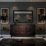 Luxurious dark wood sideboard featuring three intricately carved cabinet doors with floral and medallion detailing, styled in an elegant contemporary interior.