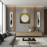 Ornate gold carved wooden wall mirror featuring an intricately hand-carved botanical frame with an antique gold finish and round mirror centre. This luxurious statement mirror enhances entryways, living rooms, bedrooms, and hallways while complementing classic, contemporary, luxury, and boutique-style interiors.