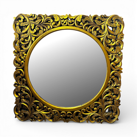 Ornate gold carved wooden wall mirror featuring an intricately hand-carved botanical frame with an antique gold finish and round mirror centre. This luxurious statement mirror enhances entryways, living rooms, bedrooms, and hallways while complementing classic, contemporary, luxury, and boutique-style interiors.