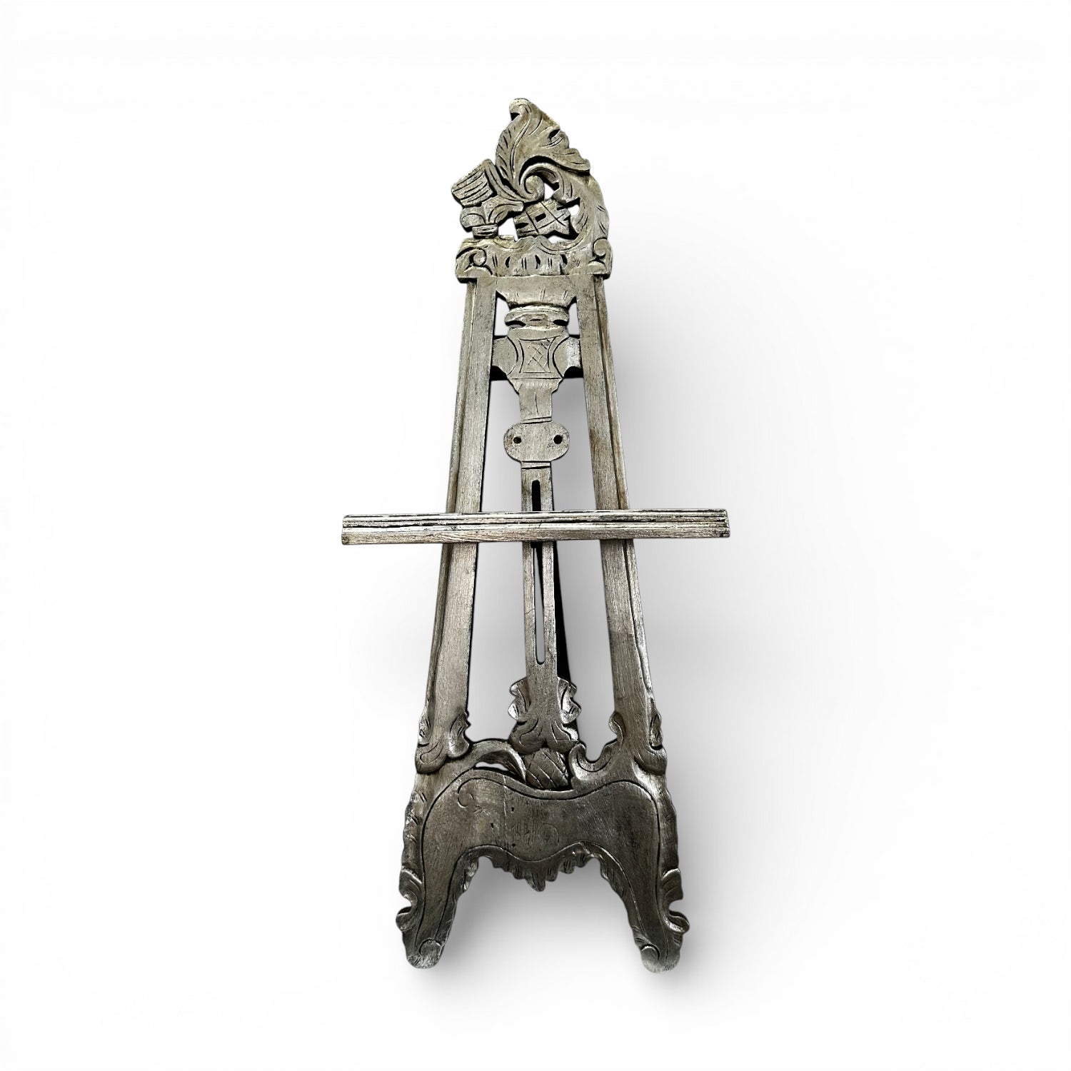 Handcrafted vintage-style wooden display easel with intricate carved detailing, distressed grey finish, and adjustable support, ideal for displaying artwork, mirrors, signage, or decorative pieces.
