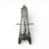 Handcrafted vintage-style wooden display easel with intricate carved detailing, distressed grey finish, and adjustable support, ideal for displaying artwork, mirrors, signage, or decorative pieces.