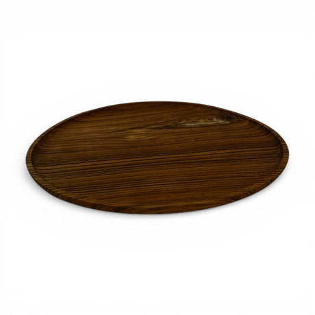 Round walnut wooden serving tray with a smooth raised edge and rich natural wood grain, perfect for serving drinks, displaying candles, styling coffee tables, or organizing decorative accessories.