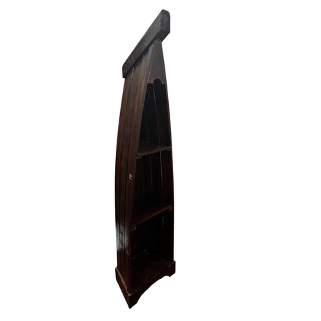 Handcrafted canoe-shaped display shelf in a dark stained wood finish, featuring three open shelves within a tall tapered silhouette, shown from an angled side view against a white background.