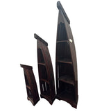 Set of three handcrafted canoe-shaped display shelves in dark stained solid wood, featuring open display compartments in three different sizes, shown together against a white background.