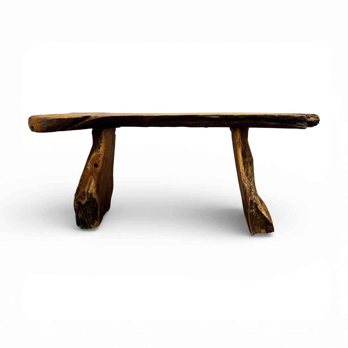 Rustic live edge wooden bench handcrafted from solid natural timber, featuring an organic slab seat and sculptural log legs, perfect for entryways, patios, gardens, or contemporary rustic interiors.