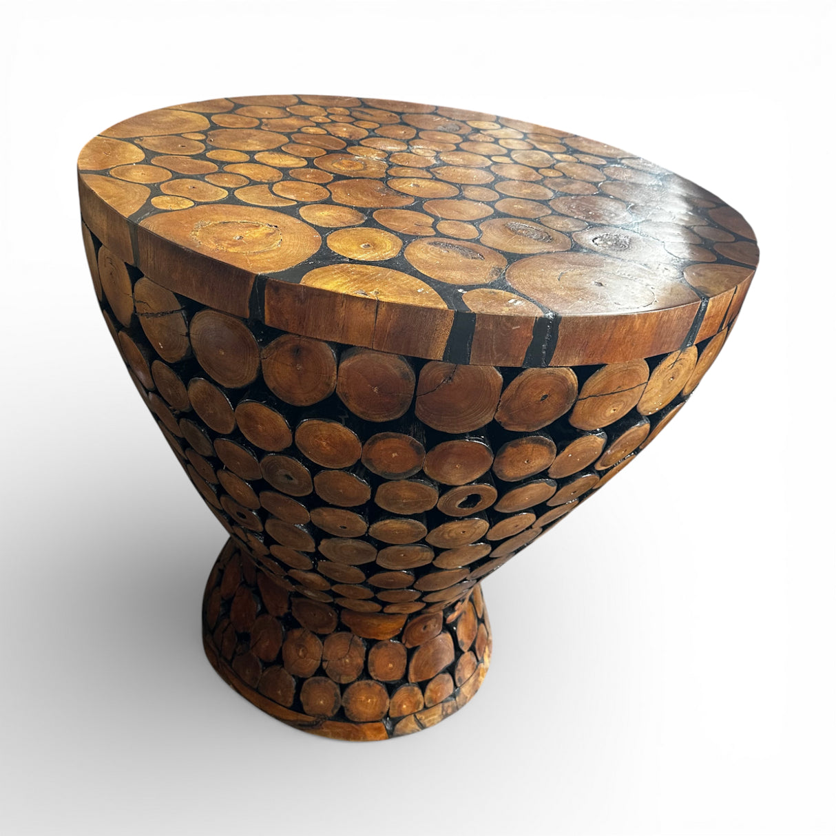 Handcrafted accent table featuring a sculptural pedestal design made from natural wood log slices, with a smooth polished top that showcases the unique grain and texture of each piece. Perfect as a side table, display pedestal, or rustic statement piece for homes, lodges, cafés, or nature-inspired interiors.