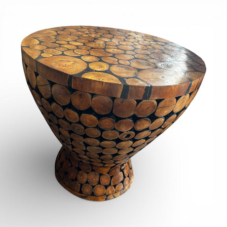 Handcrafted accent table featuring a sculptural pedestal design made from natural wood log slices, with a smooth polished top that showcases the unique grain and texture of each piece. Perfect as a side table, display pedestal, or rustic statement piece for homes, lodges, cafés, or nature-inspired interiors.