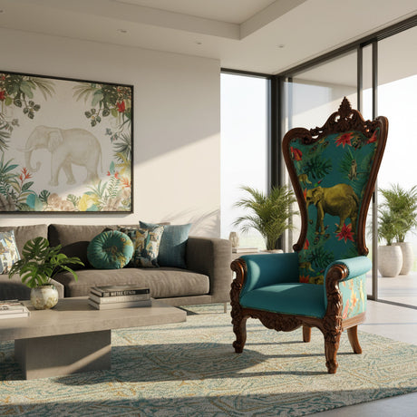 Luxury high-back wingback accent chair featuring a hand-carved dark wood frame, vibrant teal upholstery with an elephant and tropical botanical print, rolled arms, and ornate carved detailing. A bold statement chair for eclectic, luxury, and safari-inspired interiors.