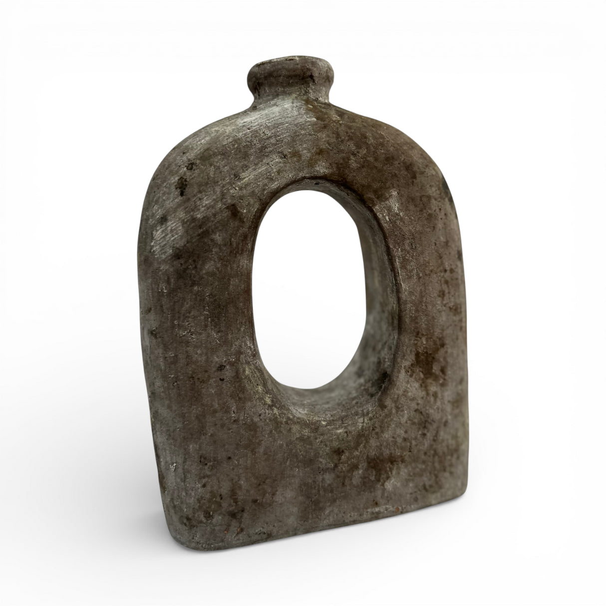 Sculptural stoneware vase with a weathered grey finish, featuring a rounded silhouette, large oval cut-out centre, and short cylindrical neck. This handcrafted contemporary vase adds organic texture and artistic character to console tables, shelves, coffee tables, and modern interiors.
