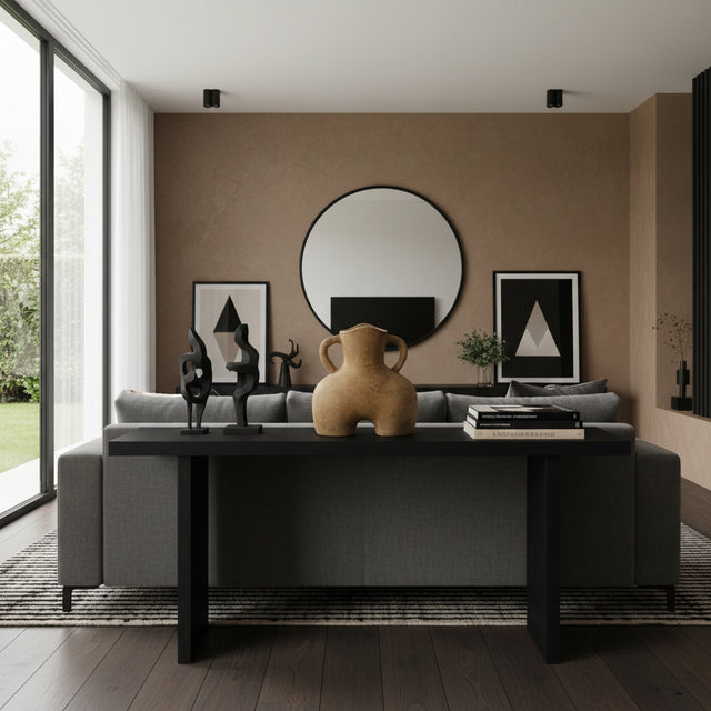 Sculptural terracotta amphora vase with a warm natural finish and distinctive rounded silhouette, featuring two curved side handles. A handcrafted statement décor piece perfect for styling console tables, shelves, or coffee tables in modern, Mediterranean, or contemporary interiors.