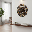 Handcrafted fish wall art featuring a circular arrangement of carved wooden fish in rich brown and natural wood tones with engraved scale detailing. A coastal-inspired decorative wall sculpture that adds warmth, texture, and artisan character to modern, rustic, and beach-style interiors.