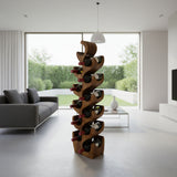 Tall handcrafted teak wood wine rack with a striking sculptural design, displayed with wine bottles in a modern kitchen. Featuring ten curved bottle holders and a rich natural wood finish, this elegant storage piece blends functional wine organization with contemporary décor.
