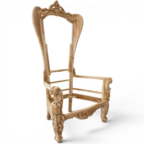 Hand-carved solid wood throne chair frame featuring an ornate floral crest, sculpted high back, decorative scroll arms, intricate carved apron, and cabriole-style legs. An unfinished luxury chair frame designed for bespoke upholstery in classic, French-inspired, and high-end interiors.