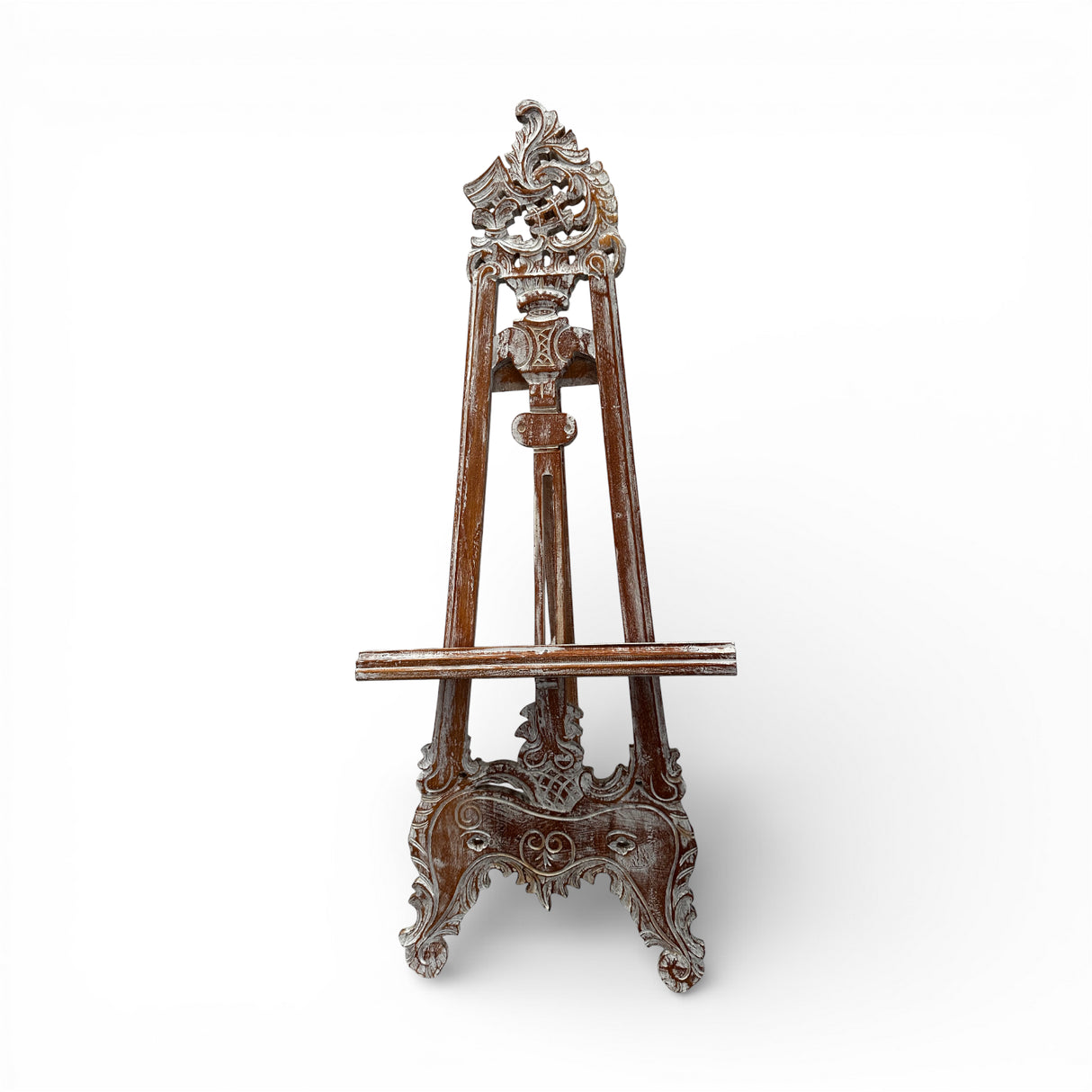 Vintage hand-carved wooden display easel featuring an ornate traditional design with intricate scrollwork and a distressed dark wood finish. Perfect for displaying artwork, framed prints, mirrors, welcome signs, menus, or decorative pieces in homes, galleries, boutique hotels, weddings, and event spaces.