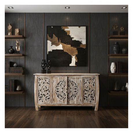 Elegant whitewashed wooden sideboard featuring four intricately carved cabinet doors with floral and medallion detailing, perfect for sophisticated interiors.