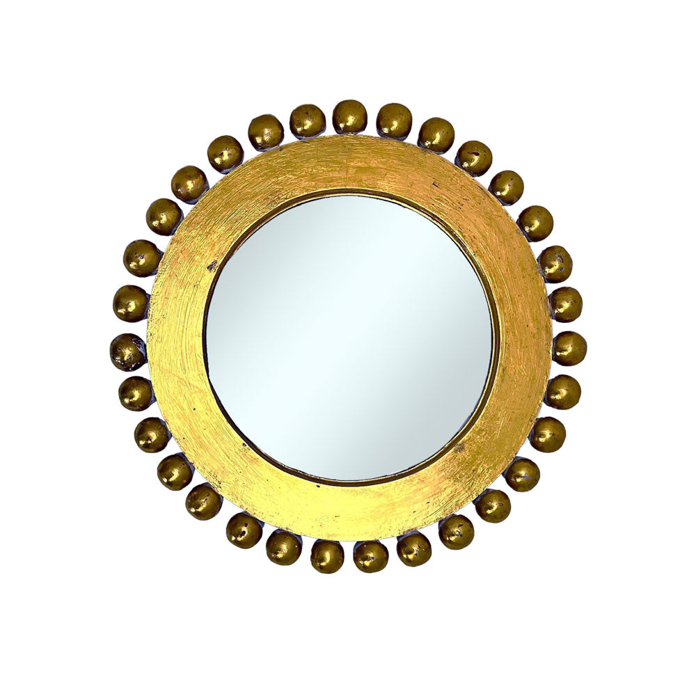 Decorative round wall mirror with an antique gold frame featuring raised beaded edging and a distressed metallic finish, adding timeless elegance and warmth to any interior.