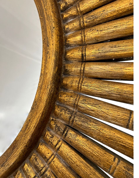 Close-up of an antique gold sunburst wall mirror showcasing the textured metallic finish, handcrafted radiating rays, and elegant vintage-inspired detailing.