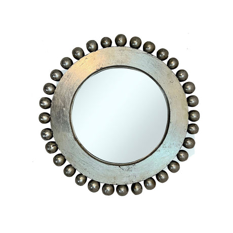 Decorative round wall mirror with an antique silver frame featuring raised beaded edging and a distressed metallic finish, offering timeless elegance for classic and contemporary interiors.