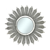 Decorative round wall mirror with an antique silver radiating sunburst frame featuring long textured rays and a distressed metallic finish, creating an elegant statement for classic and contemporary interiors.