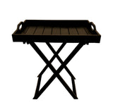 Modern black folding butler tray table with integrated side handles, a slatted rectangular serving tray, and collapsible crossed legs, ideal for serving, entertaining, or decorative styling.