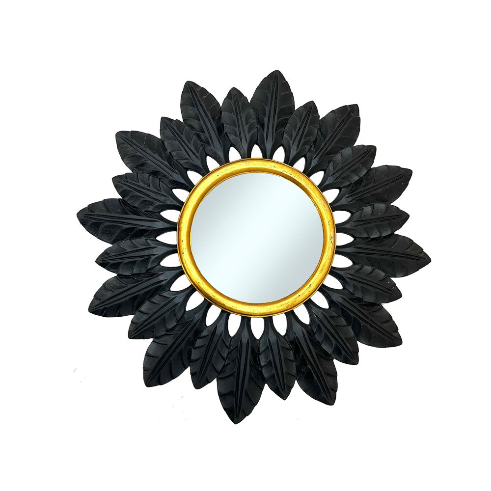 Decorative round wall mirror with a matte black feather-inspired frame and an antique gold inner border, creating a bold contemporary statement with luxurious contrast.