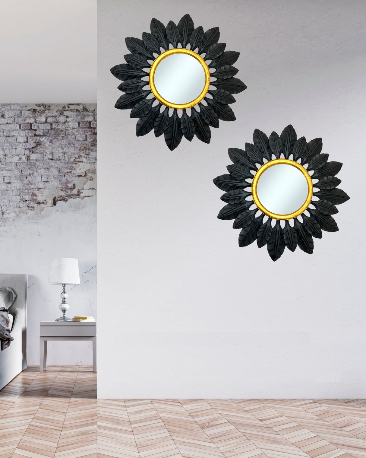 Set of two decorative black leaf sunburst wall mirrors with elegant gold inner frames, styled as a striking wall feature to add bold contrast, natural texture, and contemporary sophistication to modern interiors.