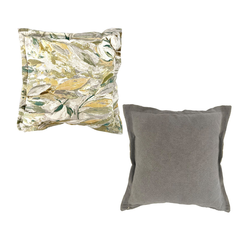 Set of two luxury scatter cushions featuring a botanical leaf print in sage green, gold, cream, and soft grey, paired with a plain textured grey cushion for a sophisticated contemporary look.
