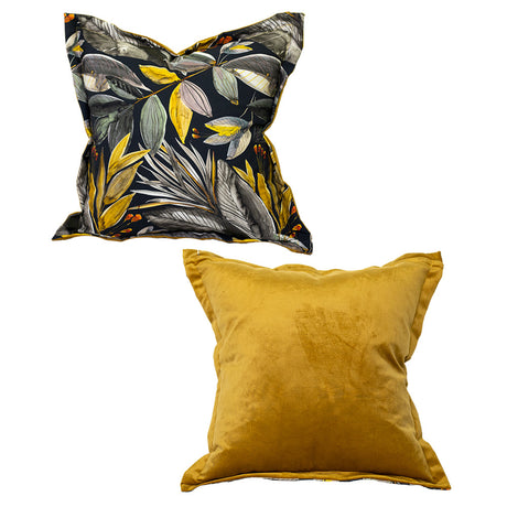 Set of two luxury scatter cushions featuring a tropical botanical print in charcoal, mustard gold, sage green, and grey, paired with a plain mustard velvet cushion for a bold contemporary look.