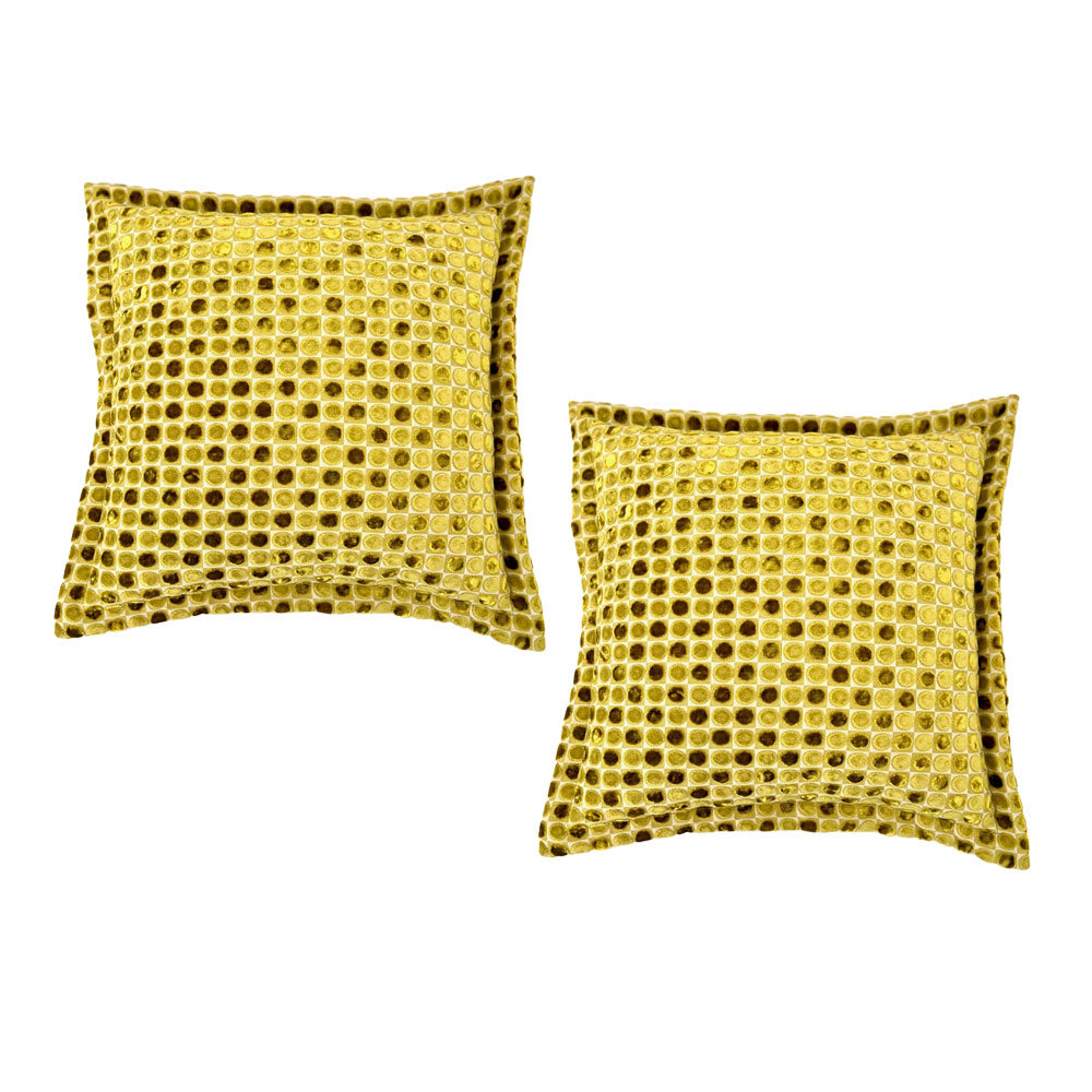 Set of two luxury square velvet scatter cushions featuring a textured mustard gold honeycomb pattern with a soft plush finish, perfect for adding warmth and contemporary elegance to sofas, armchairs, or beds.