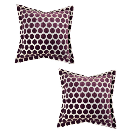 Set of two luxury square velvet scatter cushions featuring a textured plum purple polka dot pattern on a soft neutral background, adding a playful yet elegant accent to sofas, armchairs, or beds.
