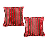 Set of two luxury square velvet scatter cushions featuring bold ruby red and blush pink vertical stripes with a soft textured finish, perfect for adding warmth and contemporary elegance to sofas, armchairs, or beds.