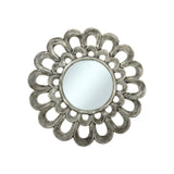 Decorative round wall mirror with a silver petal-inspired frame featuring layered openwork loops and a distressed metallic finish, creating an elegant floral statement for any interior.